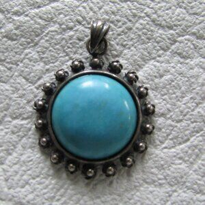 Turquoise Ornate Silver Circle Pendant
